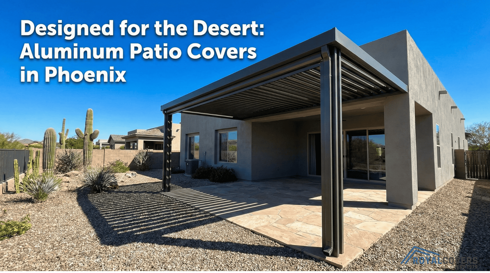 Modern aluminum patio cover in a Phoenix desert-style backyard under bright sunlight.
